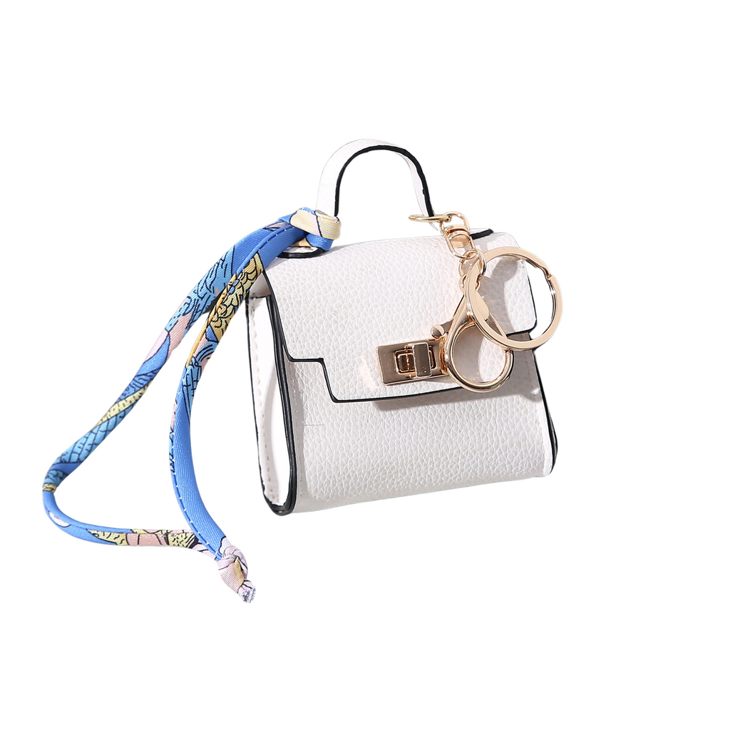White mini-handbag style dog waste bag dispenser 