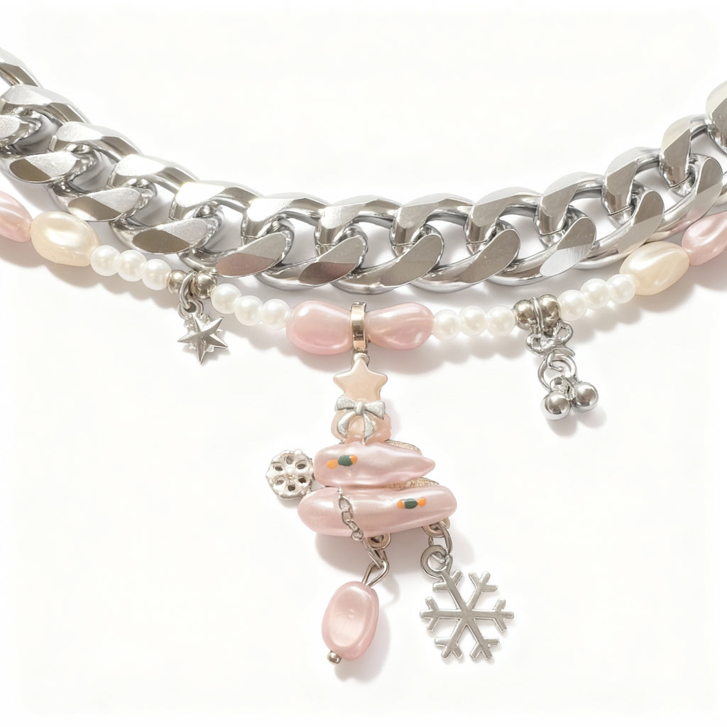 Dog silver chain necklace with pink and white pearls and charms on a white background