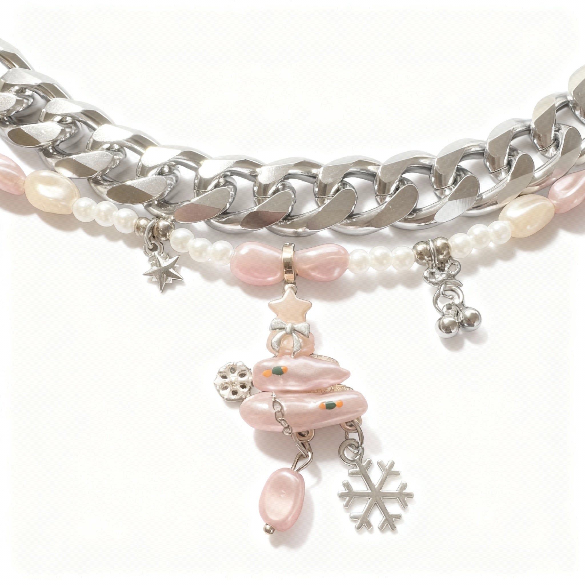Dog silver chain necklace with pink and white pearls and charms on a white background